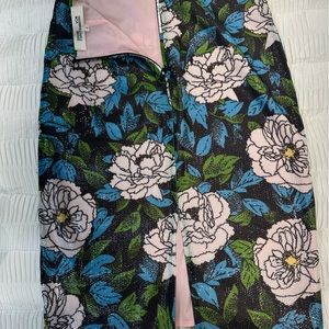 Gorgeous clear sequin pencil skirt ;  with a slit ; has lining . Worn once